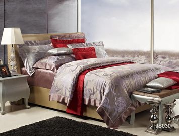 La cama de seda de lujo floral elegante brillante de Brown fija la reina y al rey del cordón